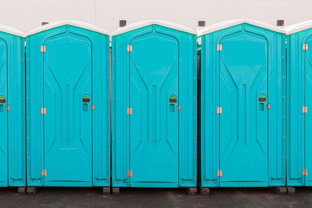 Industrial portable restroom units at a plant in Olathe, Kansas